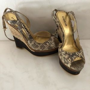 Bebe snakeskin wedges